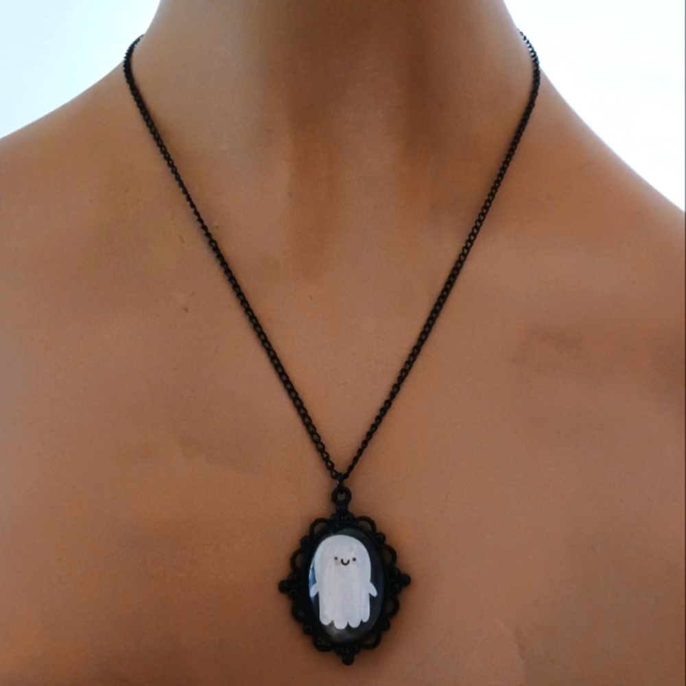 Happy Ghost Pendant in Black Frame.